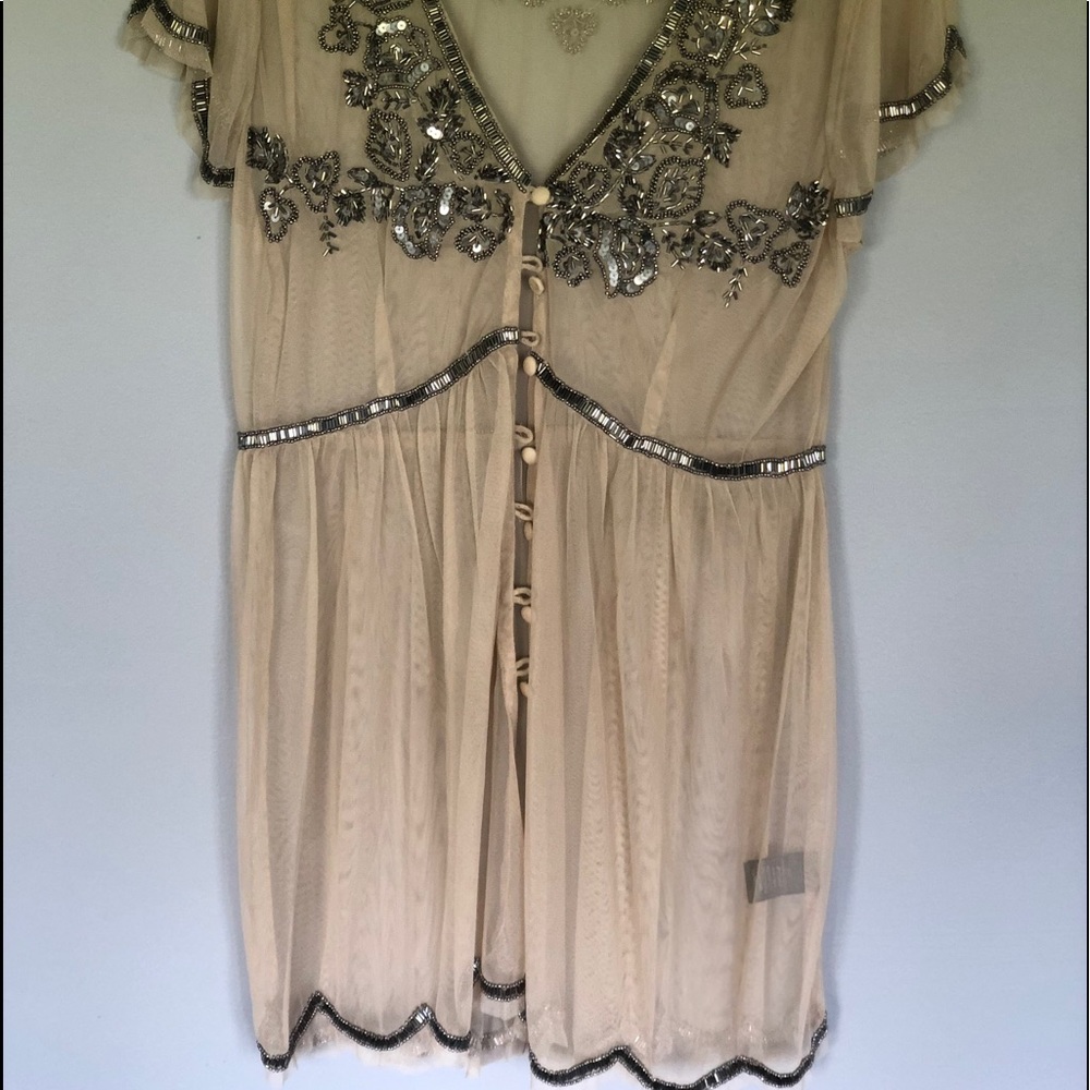 Beautiful beaded top from The Buckle, size L